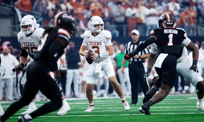 Texas quarterback Quinn Ewers looks to pass in the Big 12 title game